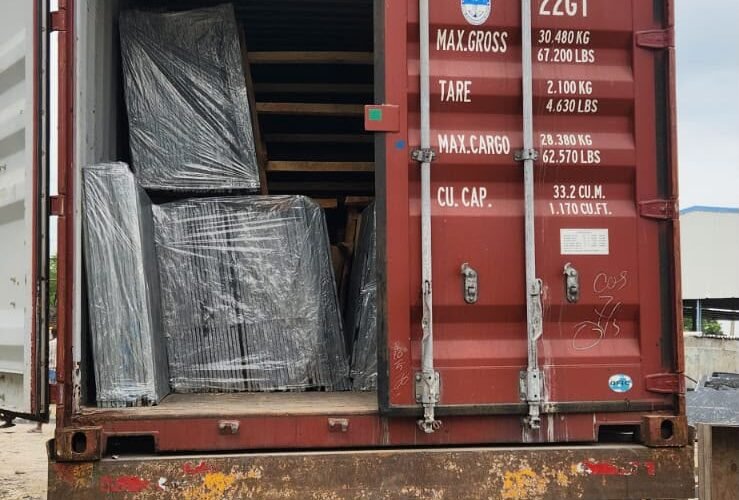 Export-Ready Container with Securely Packed Stone Slabs